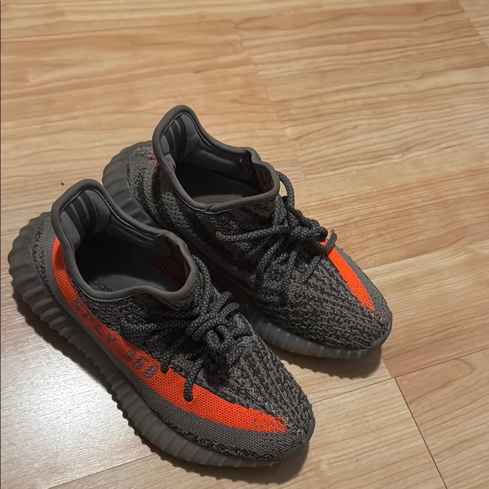 Yeezy Gray and Orange Sneakers with Boost Cushioning
